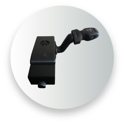 Black manual steering column control switch with a logo on a gray background.