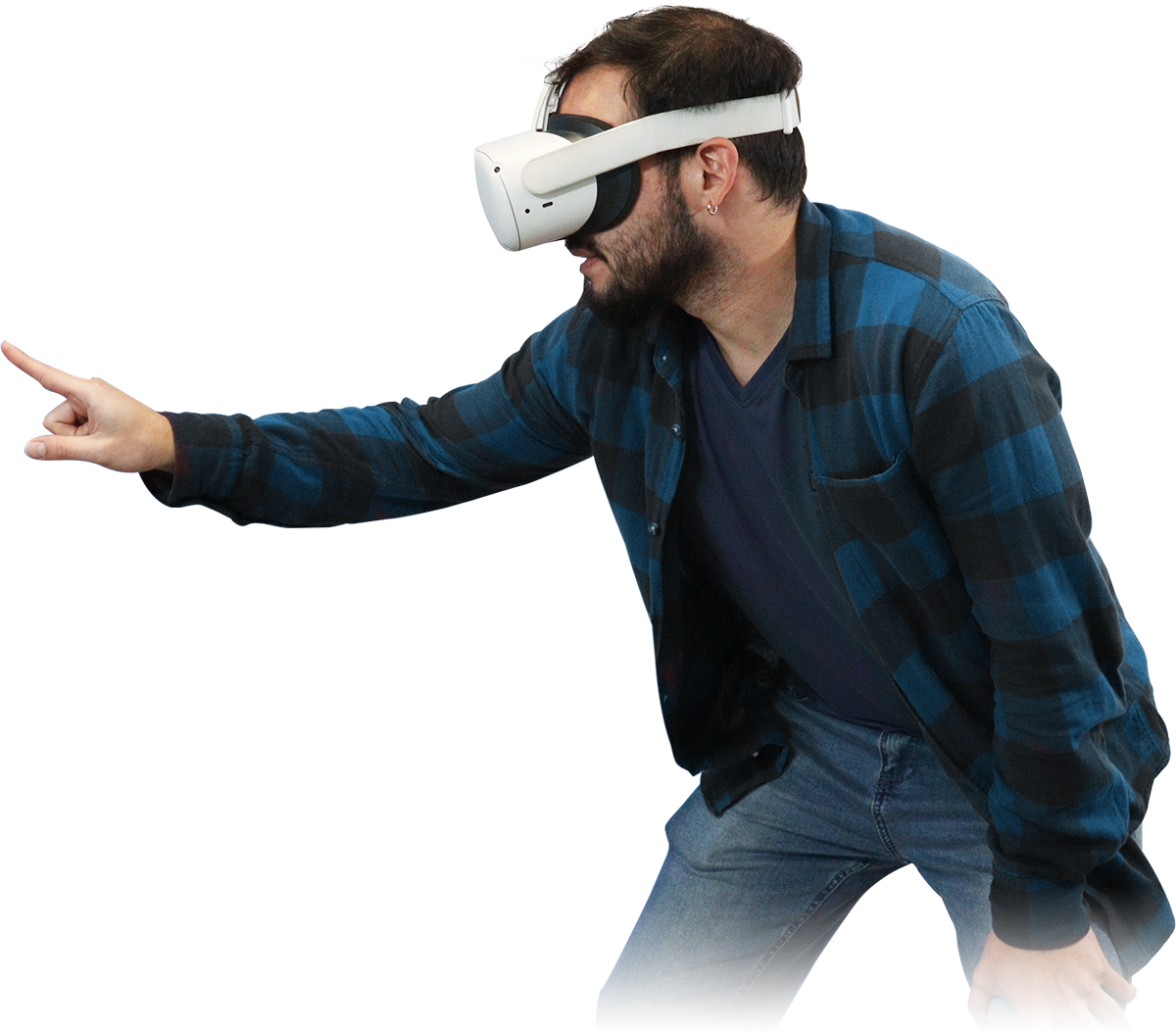 Man wearing a VR headset, pointing with his hand.