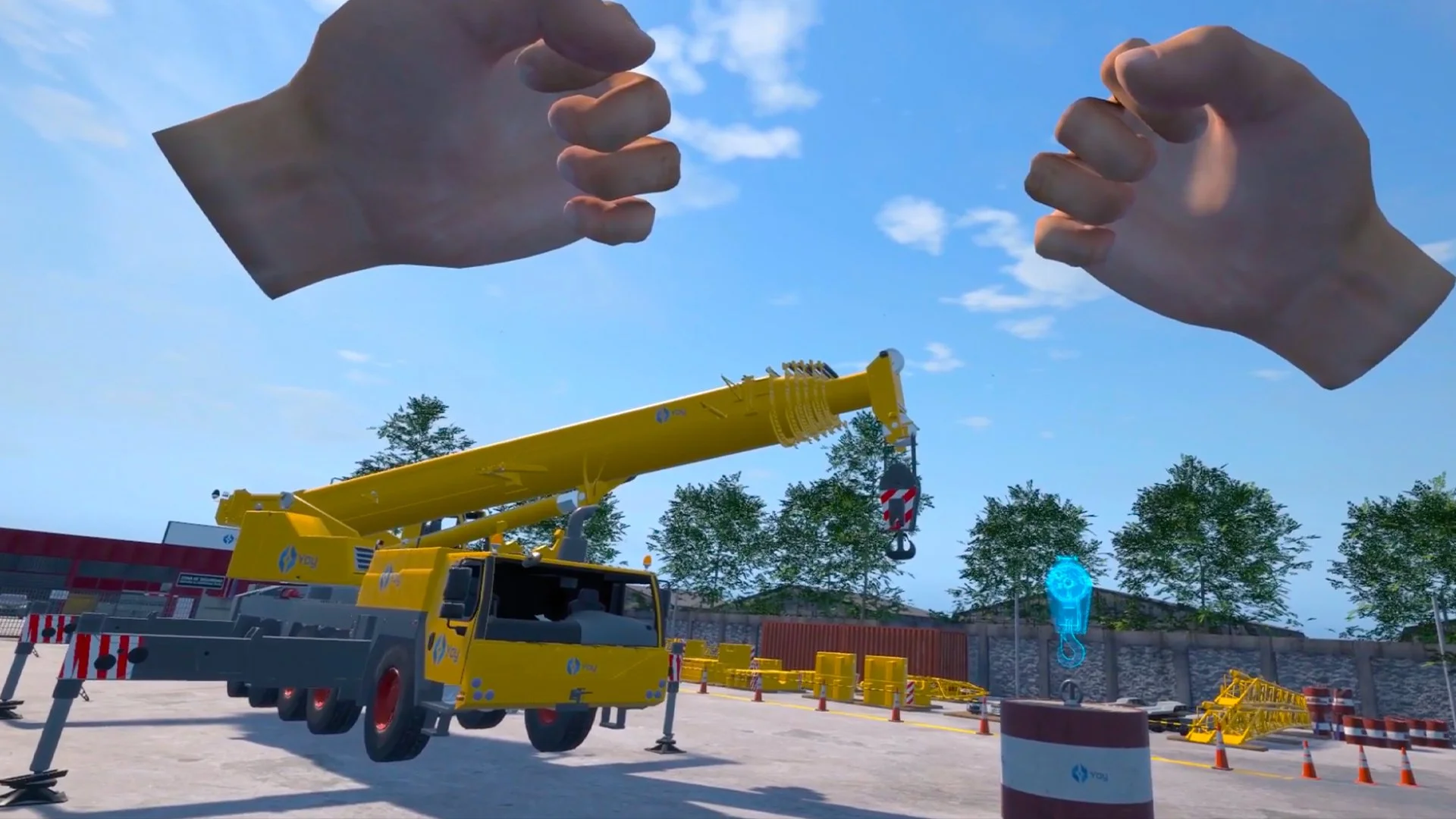 Virtual reality scene showing a yellow crane on a construction site with large virtual hands above and various equipment and barriers around.